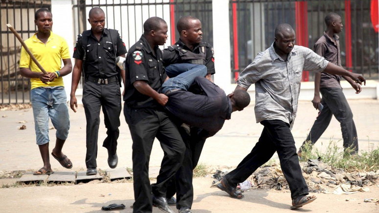 Image result for nigerian guy arrested for tattoos