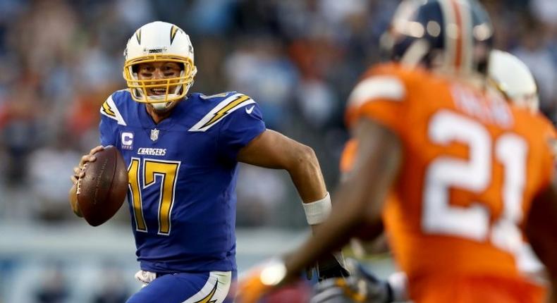 Philip Rivers of the San Diego Chargers runs from the pocket during the first half of a game against the Denver Broncos at Qualcomm Stadium on October 13, 2016 in San Diego, California