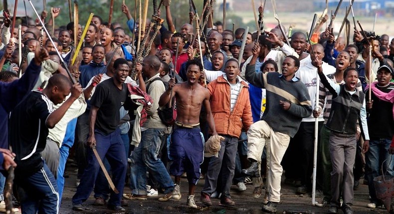 A South African mob bays for blood as xenophobic attacks engulf the country once more (AFP)