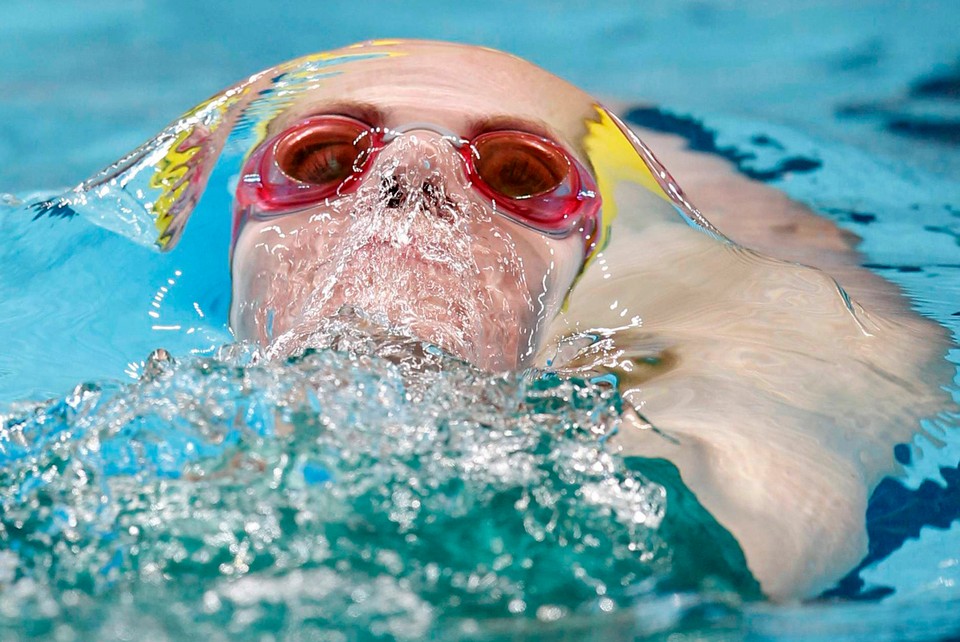 Australia's Seebohm competes in the women's 200m backstroke swimming heats during the Commonwealth Games in New Delhi