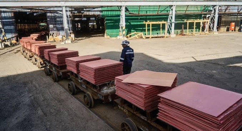 Copper plates on wagons ready for shipping at a refinery in Mufulira, Zambia. PC: Zinyange Auntony/Bloomberg