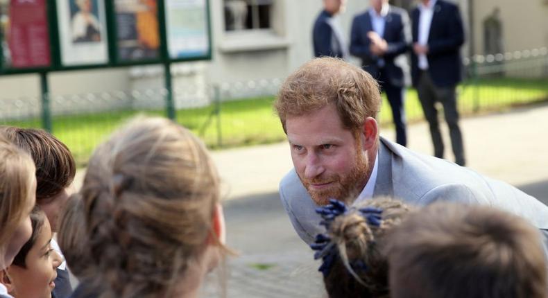 Prince Harry, Duke of Sussex talks to children as he visits the Pavilion Building in Brighton during an official visit to Sussex on October 3, 2018 in Brighton, United Kingdom. The Duke and Duchess married on May 19th 2018 in Windsor and were conferred The Duke & Duchess of Sussex by The Queen.