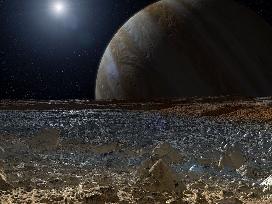 This artist's concept shows a simulated view from the surface of Jupiter's moon Europa.