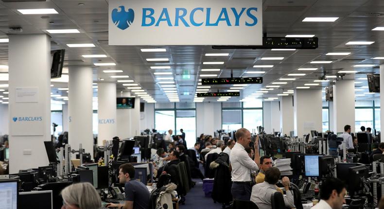 FILE PHOTO: Traders work on the trading floor of Barclays Bank at Canary Wharf in London, Britain December 7, 2018. REUTERS/Simon Dawson/File Photo