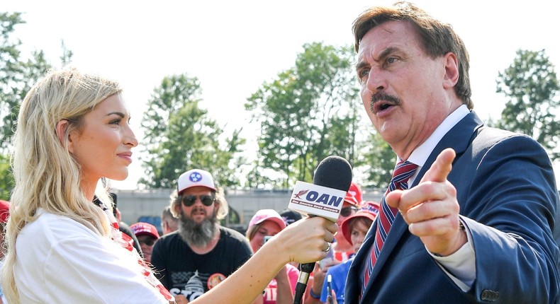 MyPillow CEO Mike Lindell is interviewed by the One America News Network during former U.S. president Donald Trump's rally at the Lorain County Fairgrounds in Wellington, Ohio, U.S., June 26, 2021.
