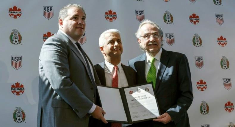 Sunil Gulati President of United States Soccer Federation (C) poses for a picture next to Victor Montagliani CONCACAF President (L) and Decio de Maria President of the Mexican Football Federation (R) after announcing the next soccer 2026 World Cup