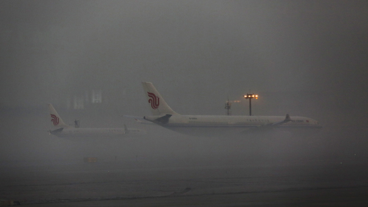 CHINA WEATHER HAZE (Heavy haze covers Beijing)