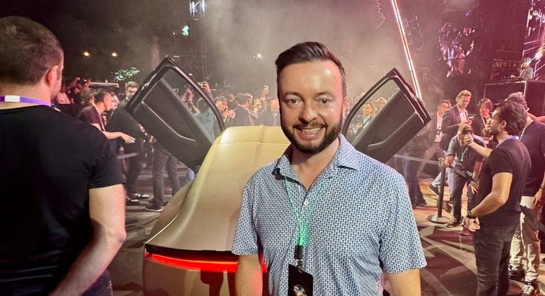 Tesla investor Matthew Donegan-Ryan in front of a Cybercab at Tesla's 'We, Robot' event.Matthew Donegan-Ryan