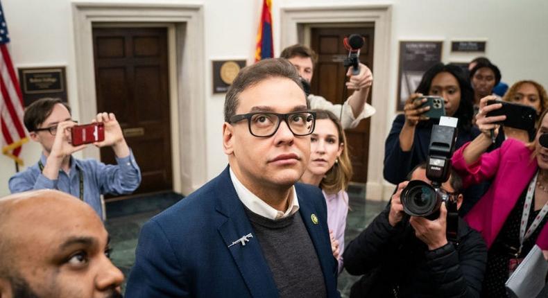 Reporters surround embattled Rep. George Santos (R-NY) as he heads to the House Chamber for a vote, at the U.S. Capitol on Tuesday, Jan. 31, 2023 in Washington, DC.Kent Nishimura / Los Angeles Times via Getty Images