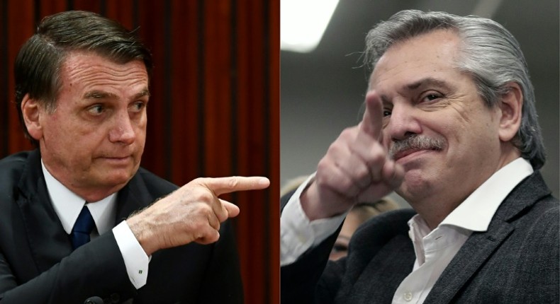 Brazilian President Jair Bolsonaro (L) expressed fears that a victory by Alberto Fernandez (R) would take Argentina on a path to economic ruin and spark an exodus