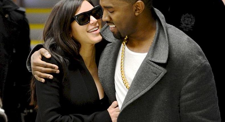 Kim Kardashian and Kanye West loved up
