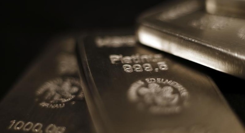 Platinum bars are stacked at the safe deposit boxes room of the ProAurum gold house in Munich March 6, 2014. REUTERS/Michael Dalder