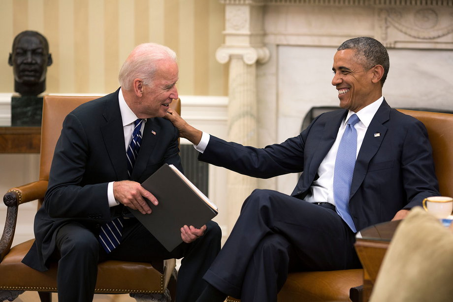Obama and Biden share a laugh in the Oval Office July 21, 2014.