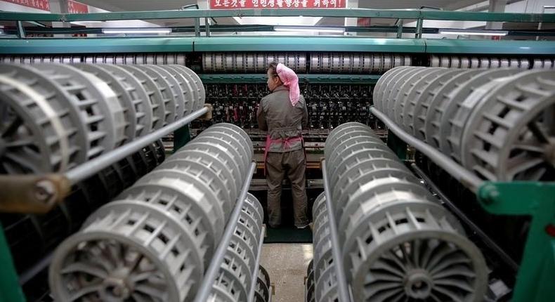 A woman works at the Kim Jong Suk Pyongyang textile mill during a government organised visit for foreign reporters in Pyongyang, North Korea May 9, 2016. 