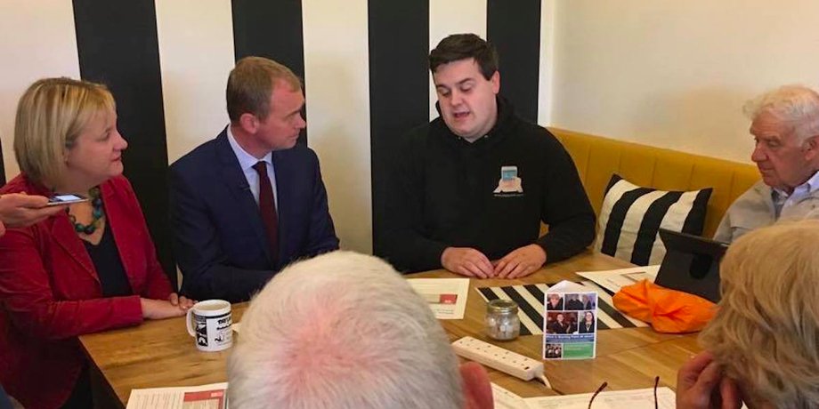 Farron speaks to locals at the Startpoint cafe, Stockport.