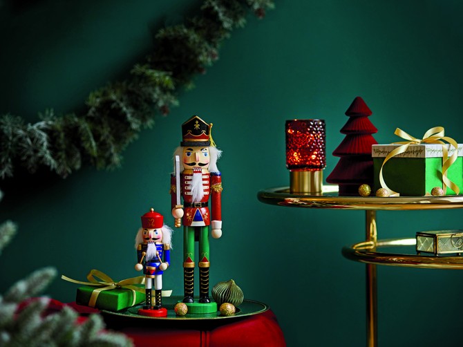 s++stock-photo-christmas-composition-on-the-red-velvet-bench-with-decoration-gifts-wreath-nutcracker-and-1851923368
