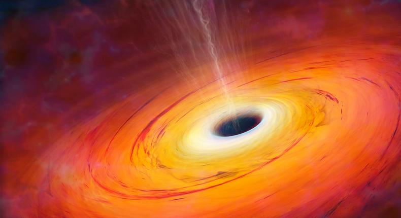 Black holes die by evaporation, Stephen Hawking theorized.Science Photo Library - MARK GARLICK/Getty Images
