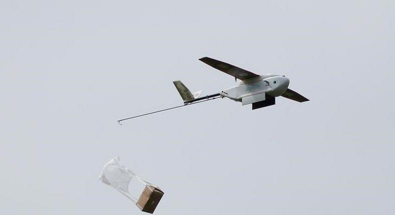 A Zipline delivery drone releases its payload midair during a flight demonstration at an undisclosed location in the San Francisco Bay Area, California, U.S., May 5, 2016. REUTERS/Stephen Lam