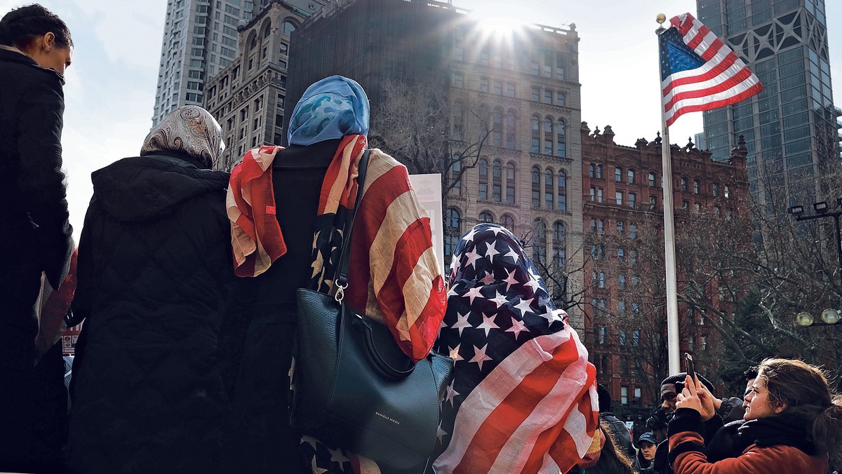 A muslim perspective Women wear an American flag head scarf for World Hijab Day at an event at City Hall in Manhattan in 2017. The day was started in 2012 when a Muslim woman in New York City invited other women to experience what it is like to wear a hijab every day in America.