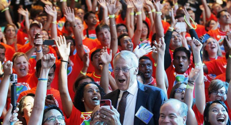 Rob Walton, then the chairman of Walmart’s board of directors, with Walmart e-commerce employees at the company's annual shareholders meeting in Fayetteville, Arkansas, in 2014.