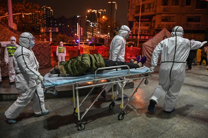 53-year old patient Yang Zhongyi takes drips at the Wuhan Eighth hospital