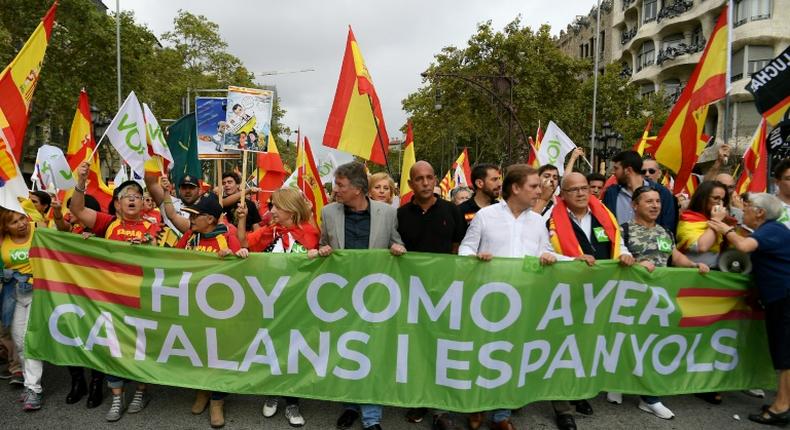 'Today as yesterday, Catalans and Spaniards': Saturday's march came on the Spain's national day