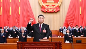 Xi Jinping makes a public pledge of allegiance to the Constitution at the Great Hall of the People in Beijing on March 10, 2023.Xie Huanchi/Xinhua via Getty Images