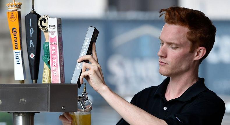 A traveler at LaGuardia Airport posted a photo of a $27.85 Sam Adams beer at a Biergarten restaurant.
