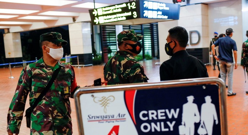 Indonesian soldiers are seen at Soekarno-Hatta International Airport after Sriwijaya Air plane lost contact after taking off, in Tangerang, near Jakarta, Indonesia, on January 9, 2021.