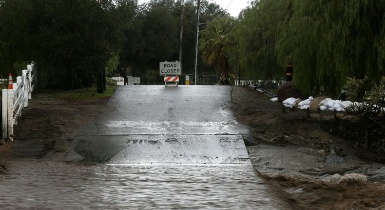 A road is blocked off due to floodwaters on January 23, 2017 in Santa Clarita, California