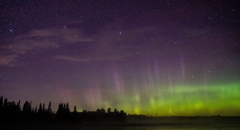 The aurora borealis may be seen above skies in the northern United States on Friday thanks to winds from a giant hole in the sun.Alex Kormann/Star Tribune via Getty Images