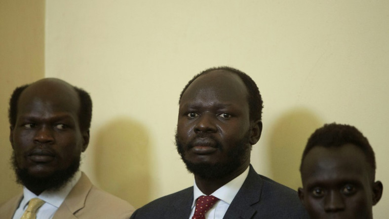 Peter Biar Ajaj (C) was convicted for  espionage, but has now won a pardon