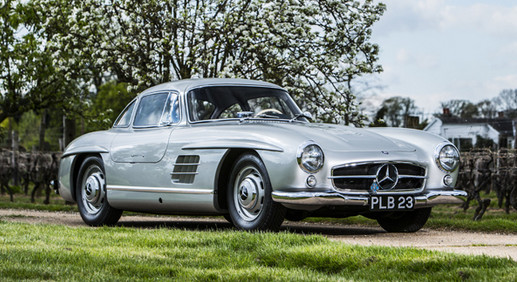 Stirling Moss i Mercedes 300 SL