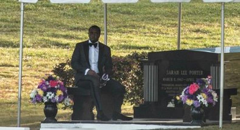 Diddy is spotted at the graveside where ex-girlfriend Kim Porter was buried.