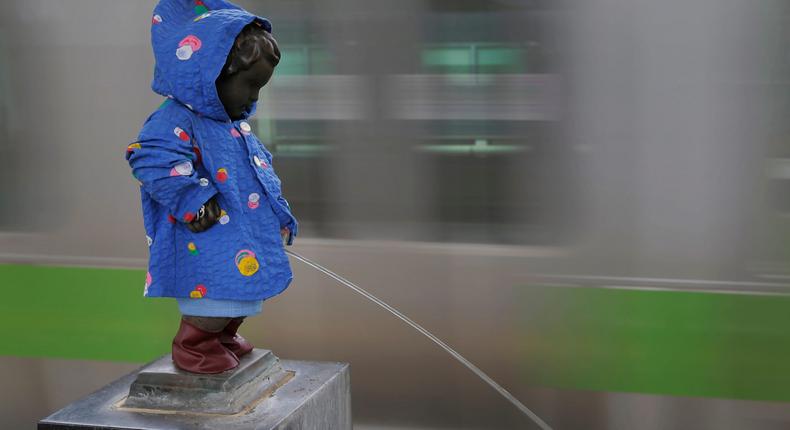 A statue in Japan of a tiny boy peeing.AP