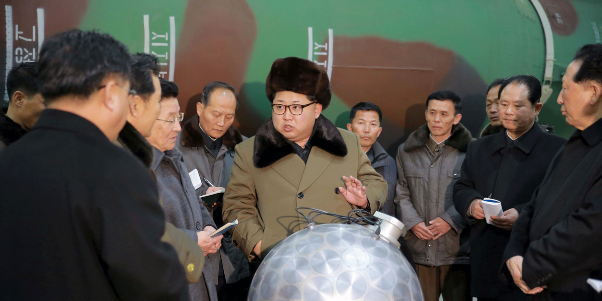 North Korean leader Kim Jong Un meeting scientists and technicians in the field of nuclear-weapon research in an undated photo released by North Korea's Korean Central News Agency in Pyongyang.