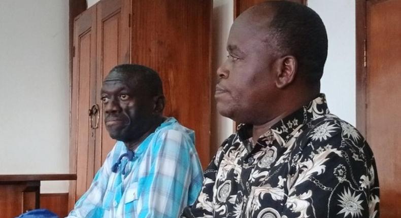 Kizza Besigye and Samuel Mukaaku