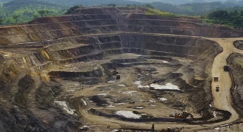 Excavators and drillers at work in an open pit at Tenke Fungurume, a copper and cobalt mine 110 km (68 miles) northwest of Lubumbashi in Congo's copper-producing south, owned by miner Freeport McMoRan, Lundin Mining and state mining company Gecamines, in a file photo. REUTERS/Jonny Hogg