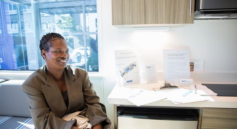 Charisse Trotter, who lives in a women's shelter in San Francisco, tours a prototype MicroPad outside the offices of Panoramic Interests in November 2016.