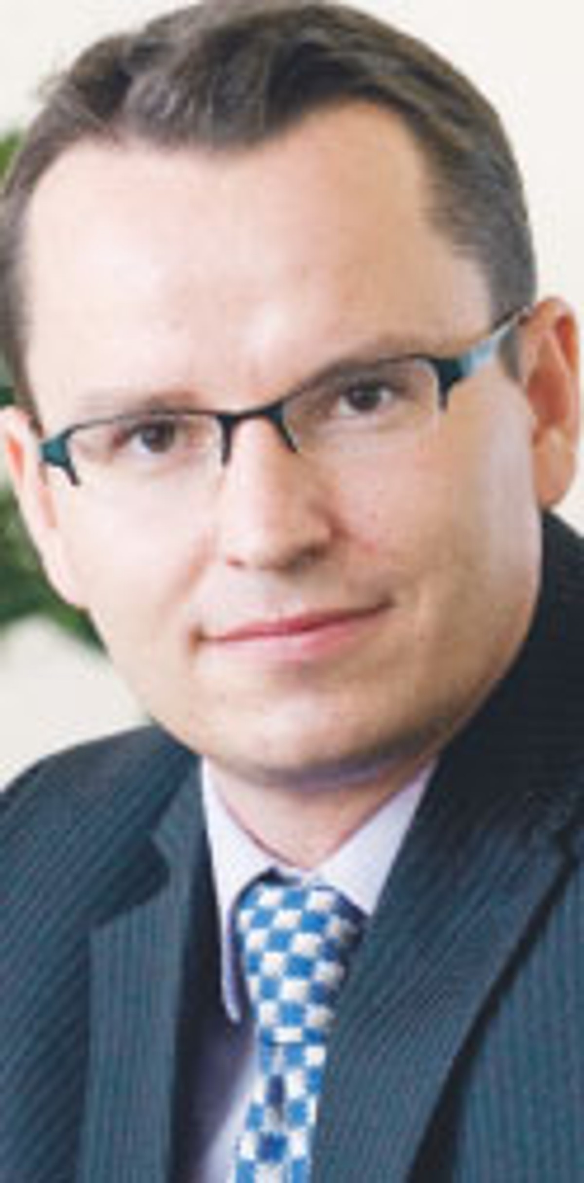 Marek Świerczyński z Kancelarii Baker & McKenzie