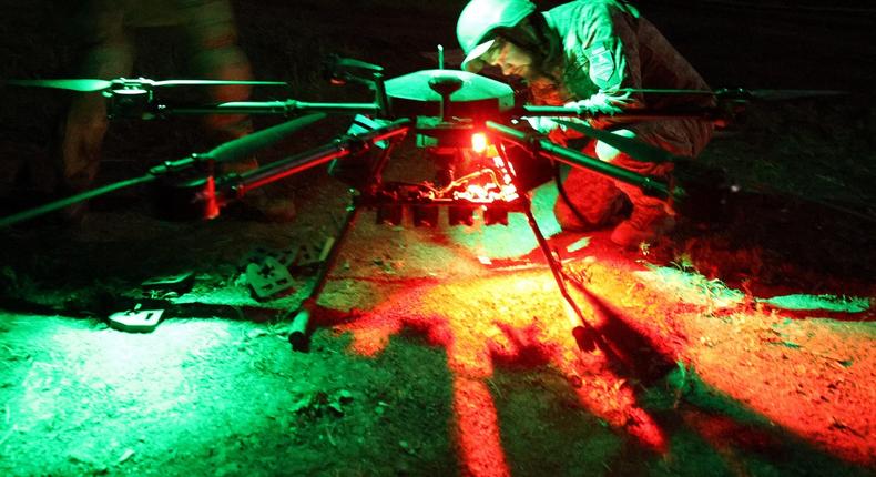 A Ukrainian soldier from the battalion of unmanned attack air systems Achilles of the 92nd Separate Assault Brigade prepares the Vampir night drone for an operation near the town of Chasiv Yar, Donetsk region, on April 22, 2024.Anatolii Stepanov/Getty Images