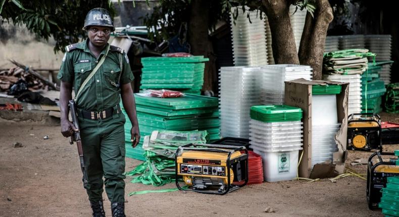 A police officer securing Nigeria's electoral materials (AFP)