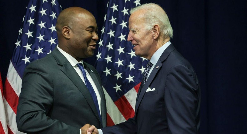 President Joe Biden greets Jaime Harrison, chairman of the Democratic National Committee, at the organization's summer meeting.Alex Wong/Getty Images