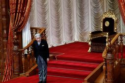 Japan's Emperor Akihito leaves from his seat after he declared the opening of an ordinary session of