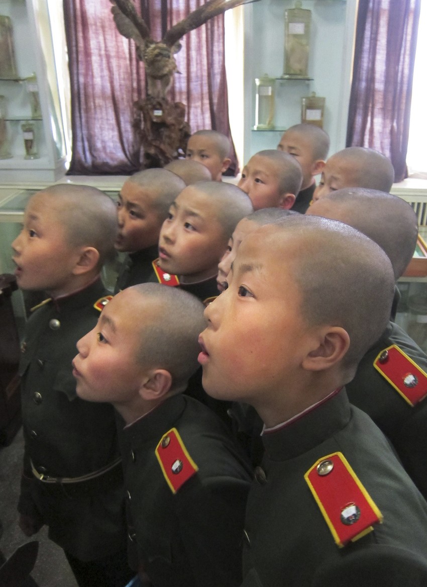 11-godišnjaci u vojničkim uniformama