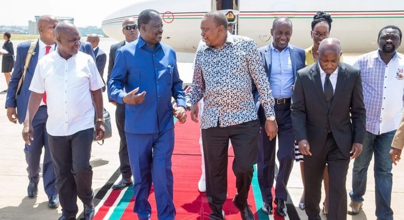 File image of President Uhuru Kenyatta with Raila Odinga in Kisumu