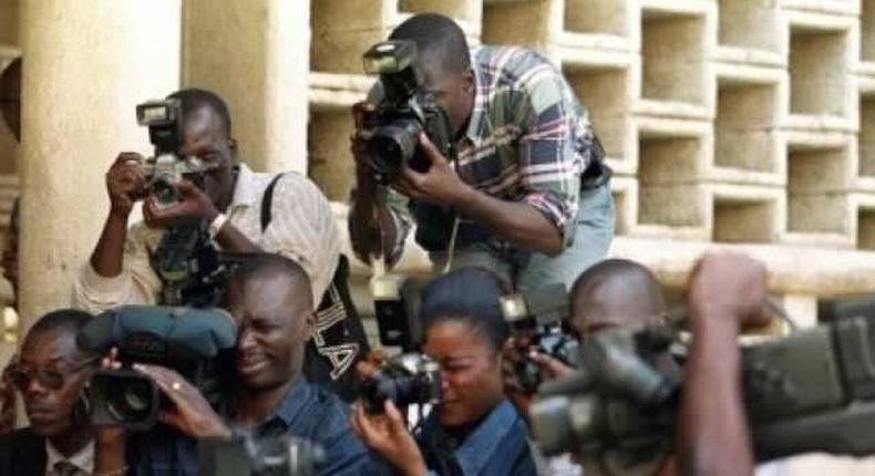 Des journalistes en reportage/AFP