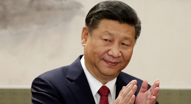 China's President Xi Jinping claps after his speech as he and other new Politburo Standing Committee members meet with the press at the Great Hall of the People in Beijing, China October 25, 2017.Jason Lee/Reuters