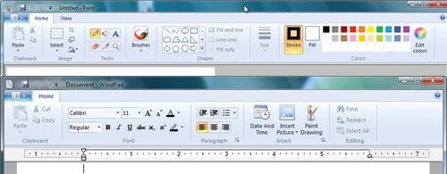 Zmieniono sposób poruszania się po programach Paint i WordPad poprzez dodanie Wstążek (ang. Ribbons), które znane są z pakietu Microsoft Office 2007