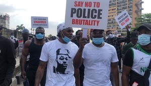 Runtown and Falz (middle) joined the protest in Lagos (Guardian)